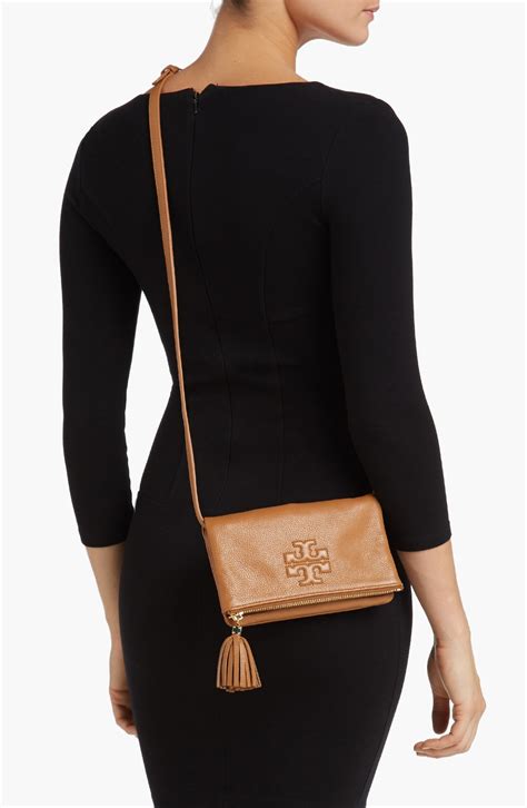 tory burch clutch crossbody.